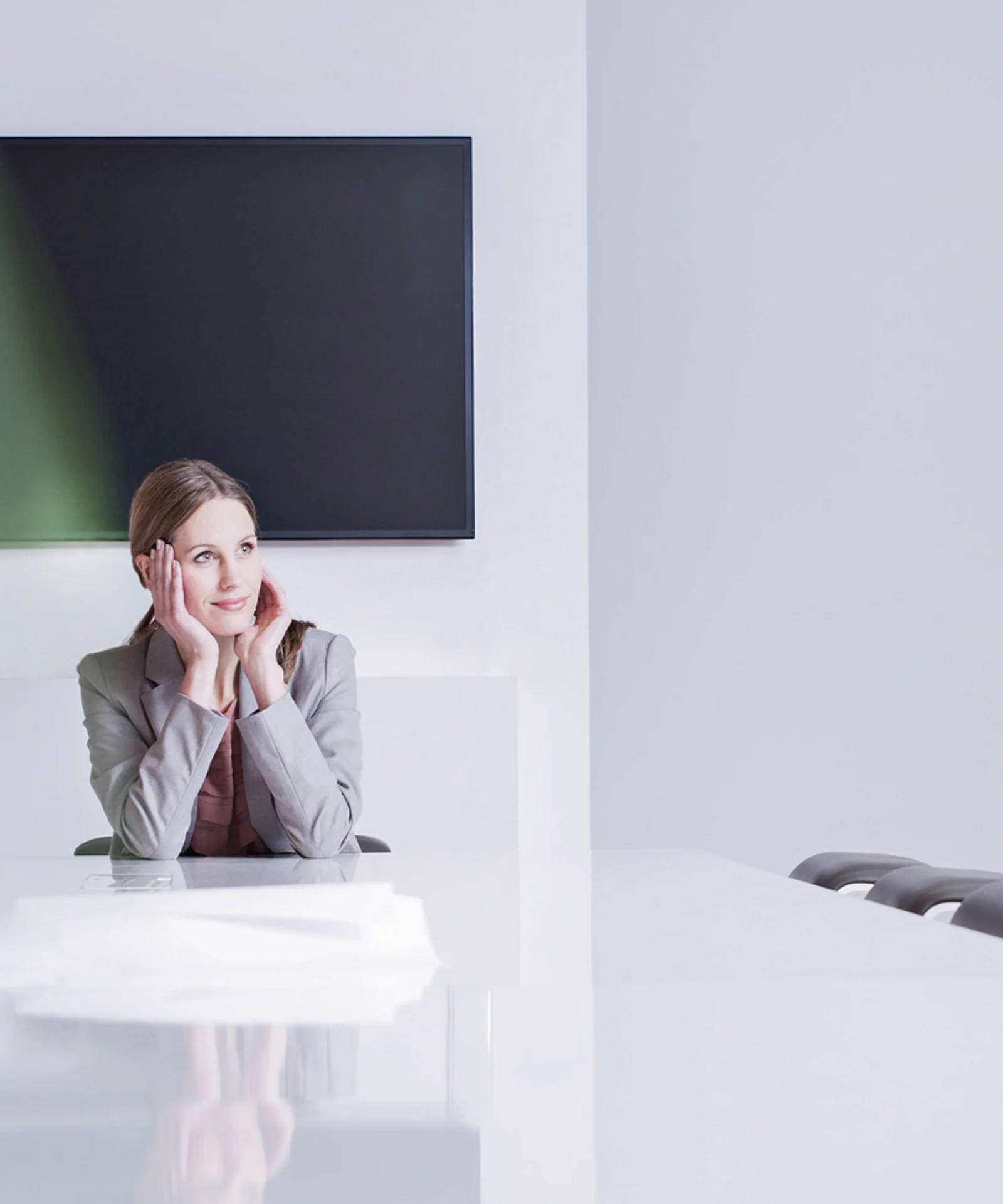 Businesswoman Reflecting in Modern Meeting Room gft-image-mood-22.jpg